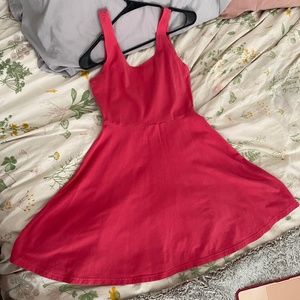 Pink sleeveless skater dress